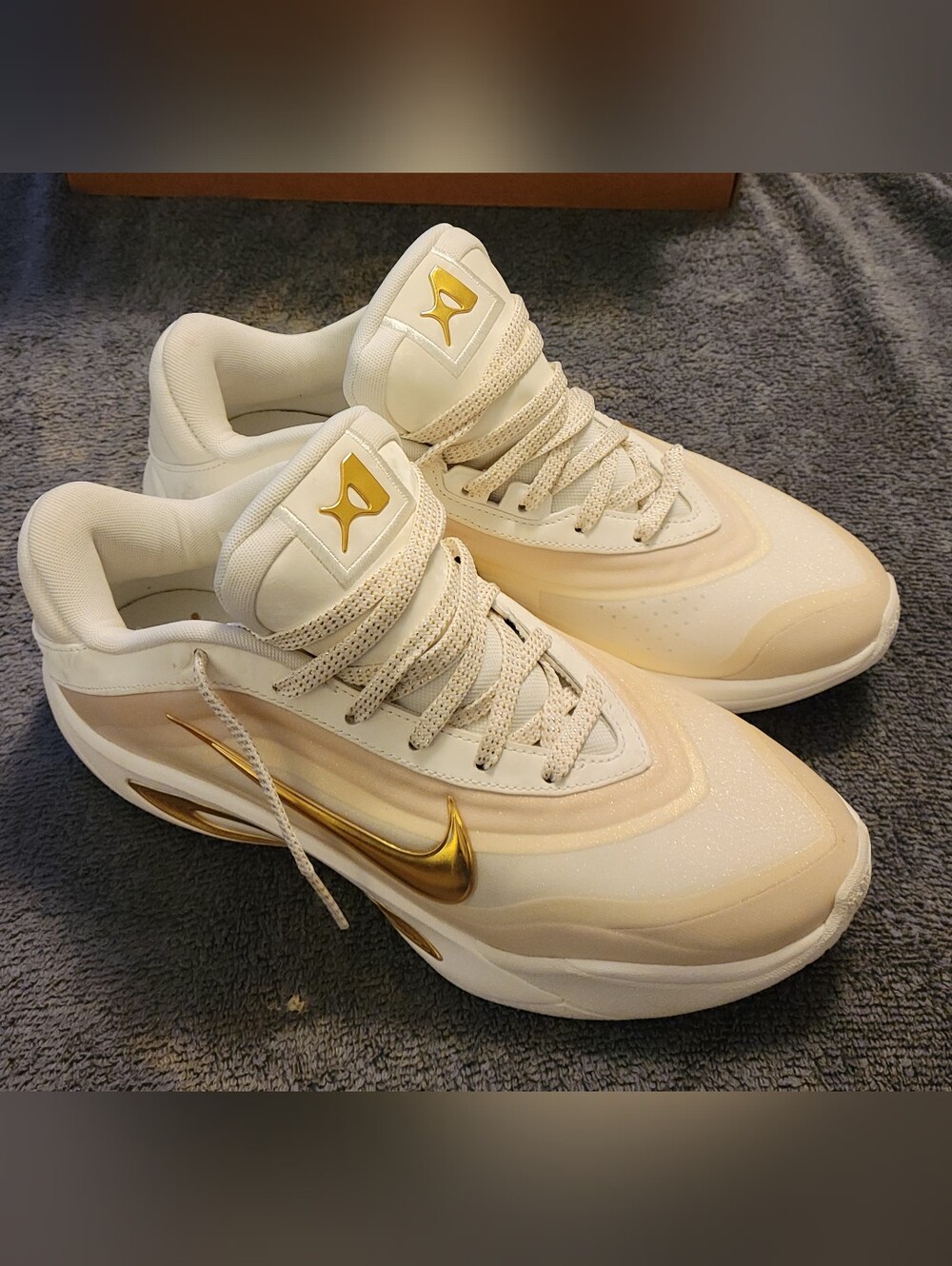 Nike Aja Wilson White and Gold Low-Top Sneakers